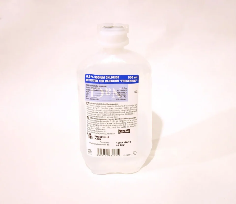 A labelled saline infusion bottle, shown as fluid-identification context rather than a slush machine