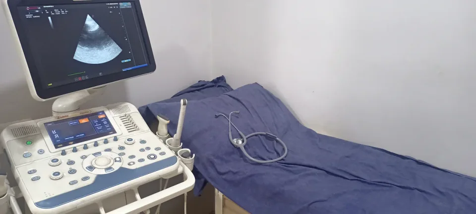 An echocardiography system and examination table, photographed in June 2022. Equipment example.